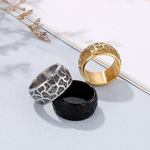 Men's vintage stainless steel rings in gold, silver, and black with totem patterns