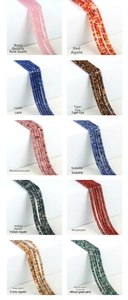 Detailed grid of diverse natural 2x4mm gemstone spacer beads for DIY jewelry making