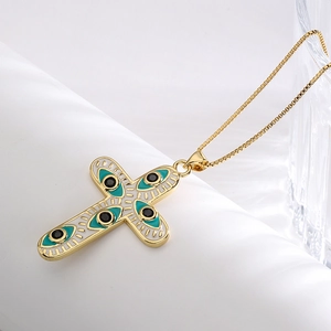 Gold-plated cross necklace with enamel eye detail and zircon pendant for women