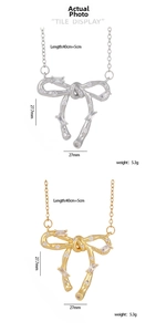 Detailed view showing dimensions of bow pendant necklace with zircon stones inlay