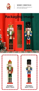 Dettaglio di schiaccianoci in legno da 38cm glitterati in confezione regalo di Natale
