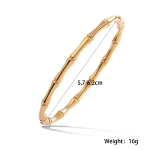 Detailed view of gold bamboo-style bangle with 5.7-6.2cm diameter and 16g weight info