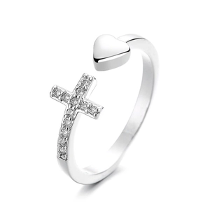 Sparkling silver cross and heart open ring with inlaid cubic zirconia in a side view