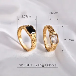 Elegant gold titanium steel ring set with black and white rectangular zircon stones