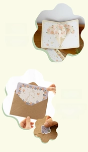 Detail of 3D popup flower bouquet greeting card with kraft envelope and seal sticker