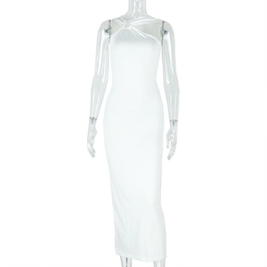 Detail of elegant white halter neck dress with metallic ring and hollow out design
