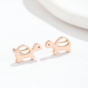 Minimalist turtle shaped stud earrings in rose gold finish on a clean white background