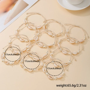 Detailed flat lay of bohemian woven shell bracelet set with starfish charms in cream color