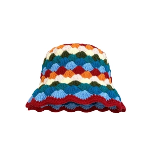 Handmade crochet bucket hat featuring colorful wave patterns and a hollow floral knit design