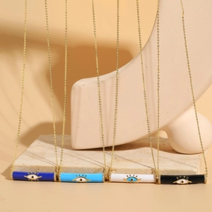 Cylindrical evil eye pendant necklace in gold finish with colorful enamel and crystals