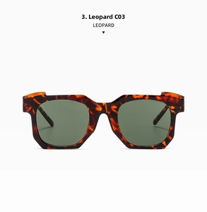 Detail of irregular tortoise shell sunglasses frames with dark tinted lenses, model C03