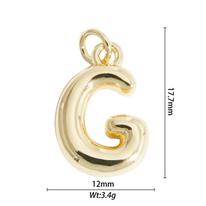 Macro shot of 17.7mm golden balloon letter G pendant showing dimensions and 3.4g weight