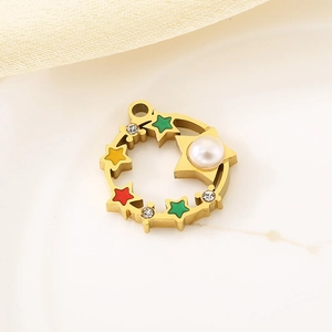 Detailed close-up of 18K gold star charm with enamel and pearls for jewelry DIY