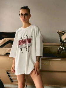 Oversized λευκό βαμβακερό T-shirt με vintage σχέδιο μπαλέτου και γράμματα σε γκαράζ