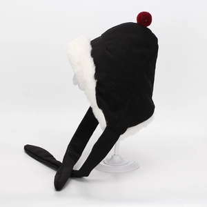 Detail einer schwarzen Kinder-Ohrenklappenmütze aus Cord mit weißem Fleece und rotem Bommel