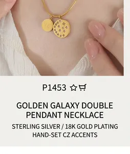 Detailed close-up of golden double pendant necklace with star motif and engraved coin