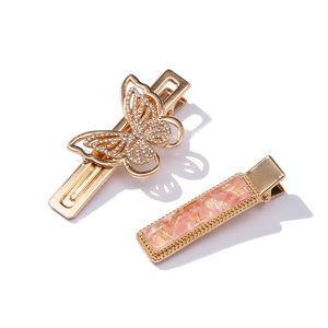 Elegant gold butterfly hair clip with rhinestones and pink quartz barrette for women