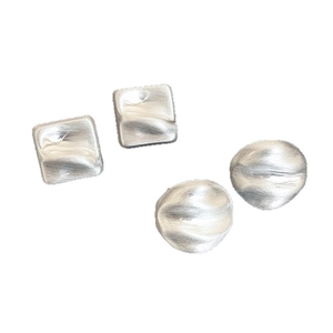 Minimalist silver geometric stud earrings with brushed texture in square and round shapes