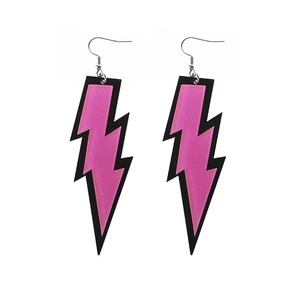 Detailed view of pink glitter lightning bolt acrylic earrings with silver hooks