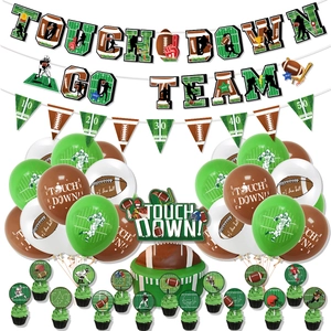 Detail view of American football party set with banners, balloons and cake toppers