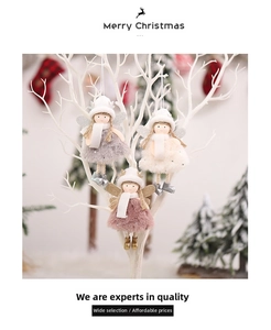Detailed view of plush angel ornaments in grey, white, and pink for Christmas tree decor