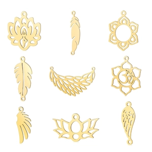 Detailed close-up of golden stainless steel lotus and feather charms for DIY jewelry making