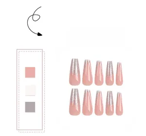 Detailed view of long coffin press-on nails with white French tips and silver glitter