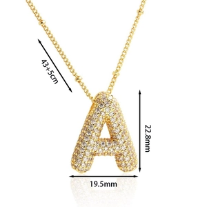Detail view of gold letter A pendant with cubic zirconia inlay and 43+5cm chain dimensions