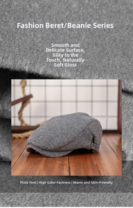Close-up of thick grey wool flat cap fabric texture and its warm felted finish