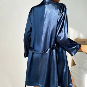 Navy blue silk-like satin robe with long sleeves and belted waist shown from the back