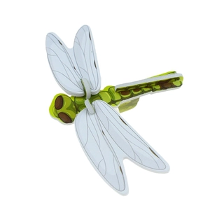 Detailed macro view of a 3D green paper dragonfly model with white patterned wings