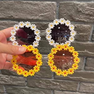 Chic daisy-shaped kids sunglasses with UV400 protection and flower petal frames