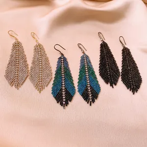 Sparkling feather leaf tassel earrings with rhinestones in silver, blue, and black styles
