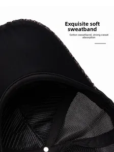 Detail of soft cotton sweatband and breathable mesh design inside a black baseball cap