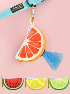 Detail of fruit-themed pet poop bag dispensers with metal hooks and zipper closure