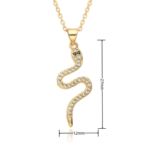 Detail view of gold snake pendant with micro-pave white crystals and dimensions 27x12mm