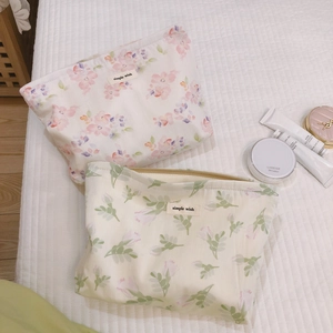 Floral cotton quilted makeup bags with pink flowers and green leaves pattern