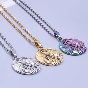 Celestial sun and moon necklaces in silver, gold and rainbow colors on blue background