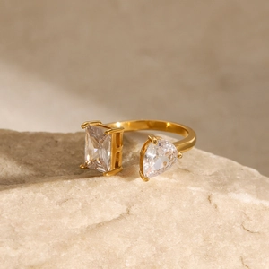 Adjustable 18k gold plated stainless steel ring with pear and emerald cut cubic zirconia