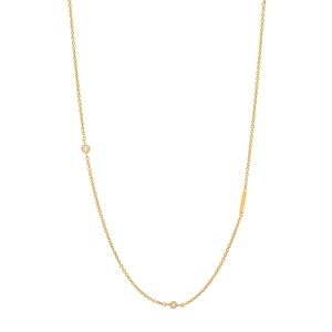 Close-up of gold S925 silver necklace featuring sparkling diamonds and a rectangular plate
