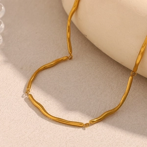 Minimalist 18K gold plated wavy bar necklace for women with a sleek metallic finish