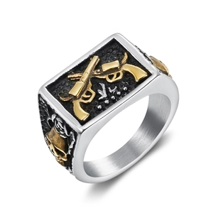 Vintage stainless steel ring for men featuring golden skulls and twin guns in punk style