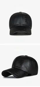 Détails des lettres JAM gaufrées et du sceau 1985 sur la casquette en cuir PU noir