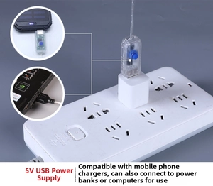 Close-up of USB controller for LED snowflake lights showing 5V power compatibility