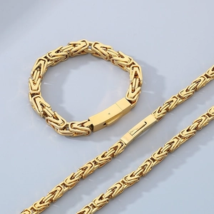 Detail of gold Byzantine chain set showing thick braided links and polished metal finish