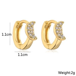 Detailed view of 18K gold plated moon earrings with zircon, size 1.1cm and weight 2g