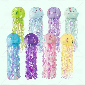 Detail of colorful jellyfish paper lanterns with marine-themed glitter sea shell decorations