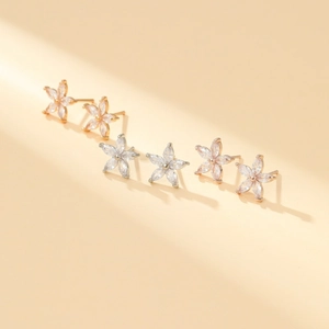 Elegant S925 silver snowflake stud earrings with 14K gold plating and zircon flower petals