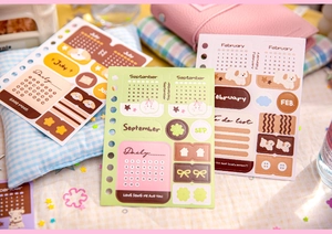 Detail of Heartbeat Signal collection stickers showing monthly plans and daily tasks