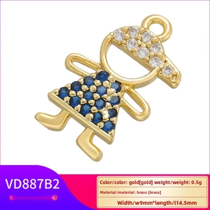 Close-up of gold brass girl pendant with blue and white zircons for jewelry making